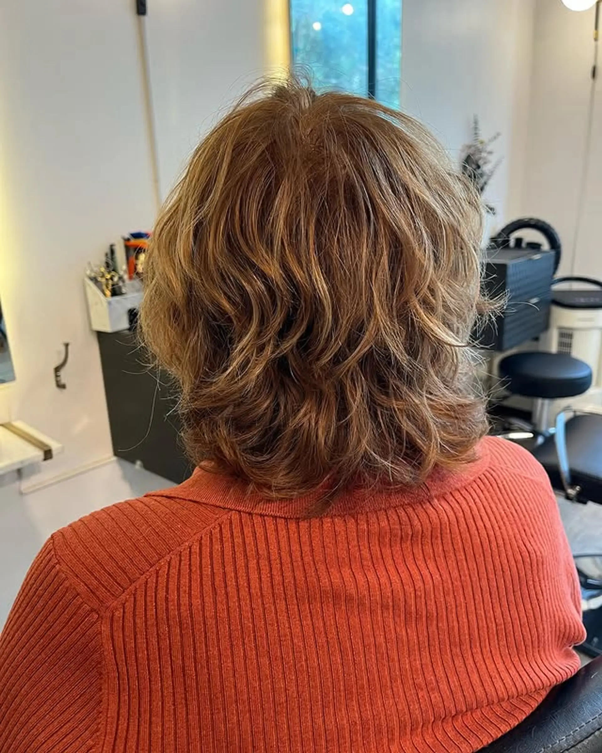 A shaggy, layered mullet with plenty of texture and movement. 1