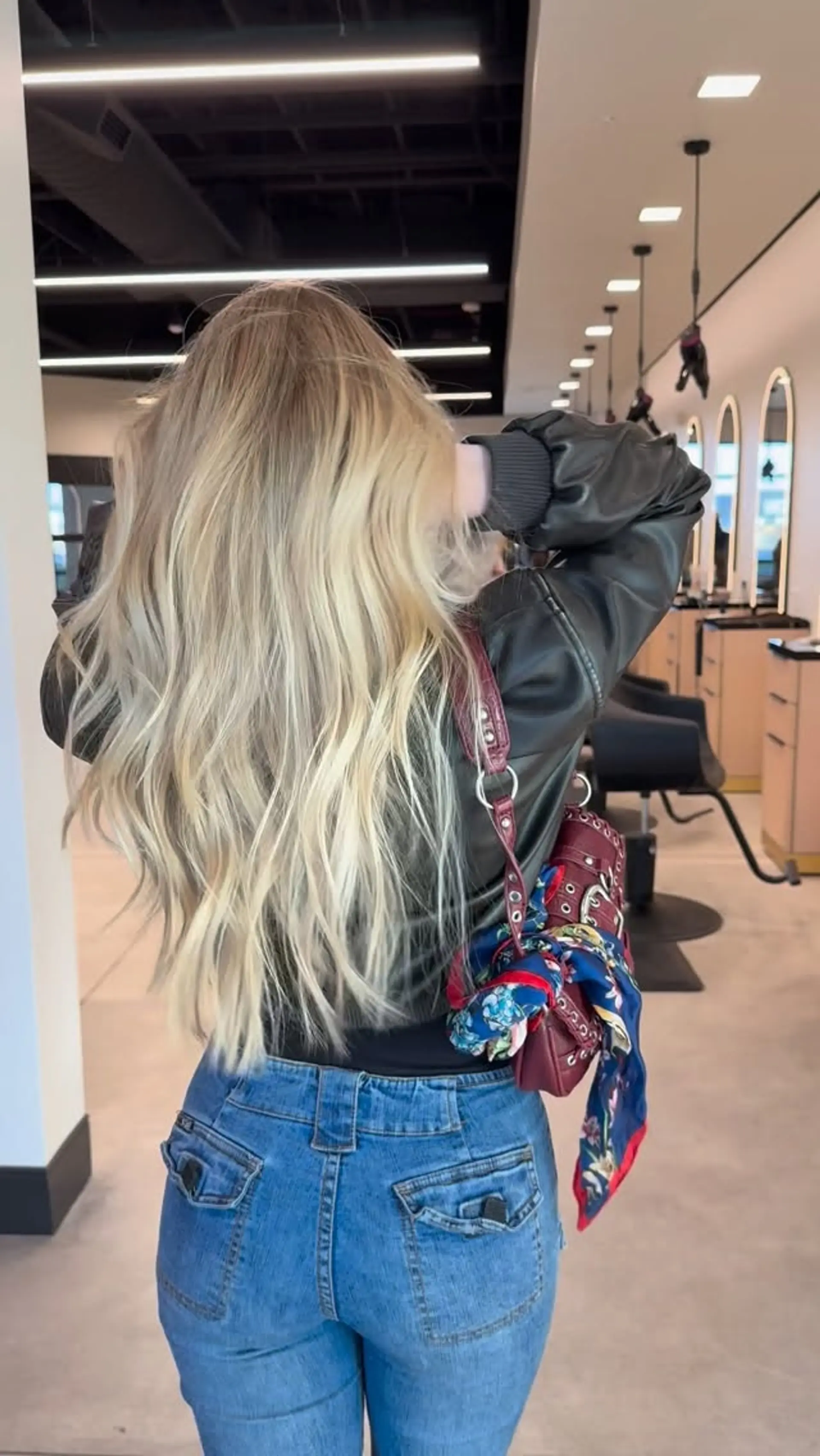 Long, bright multidimensional blonde hair with light natural waves and soft layering. 1