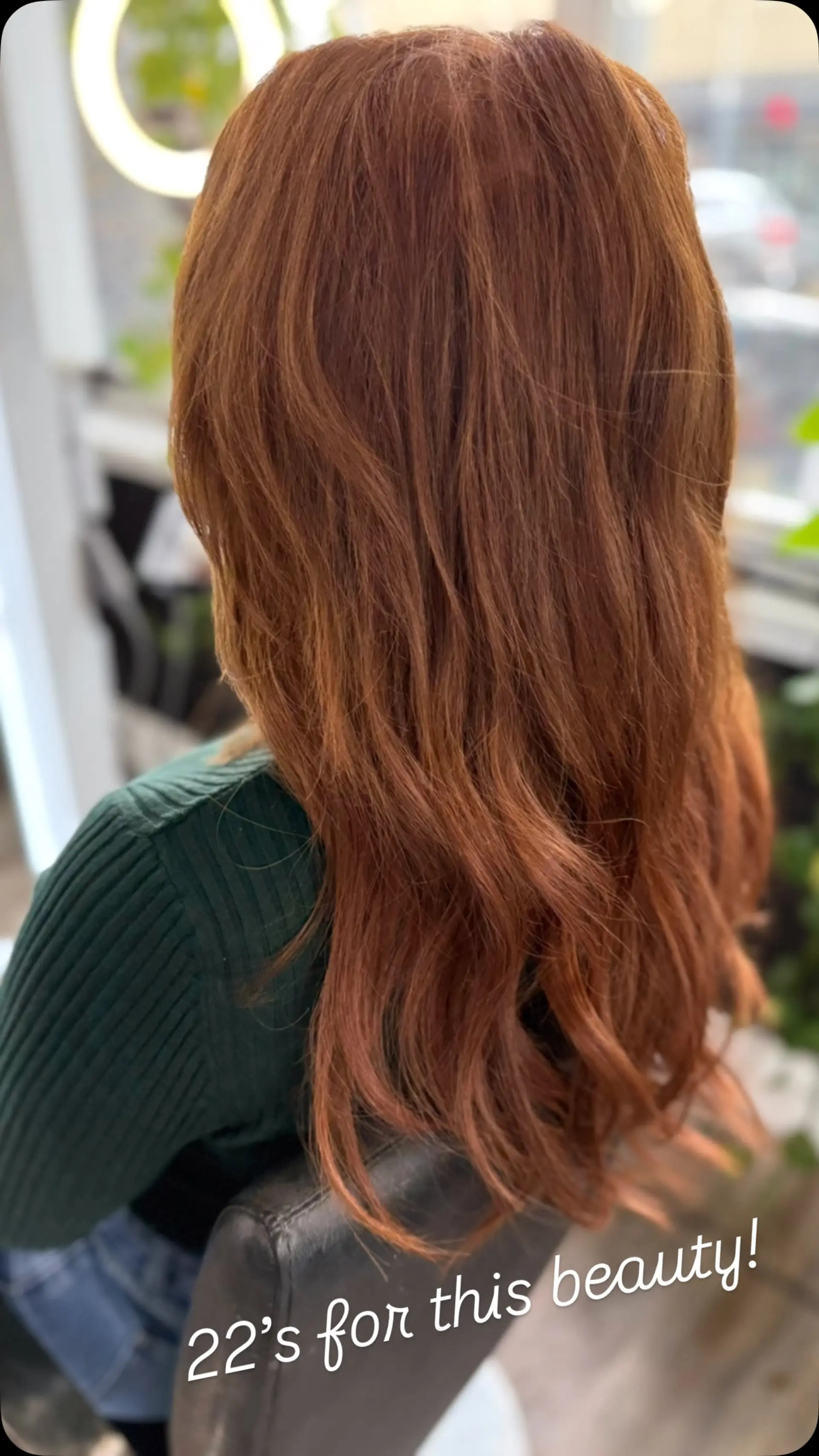 Long copper-red hair styled in soft, natural waves cascading down the back. 1