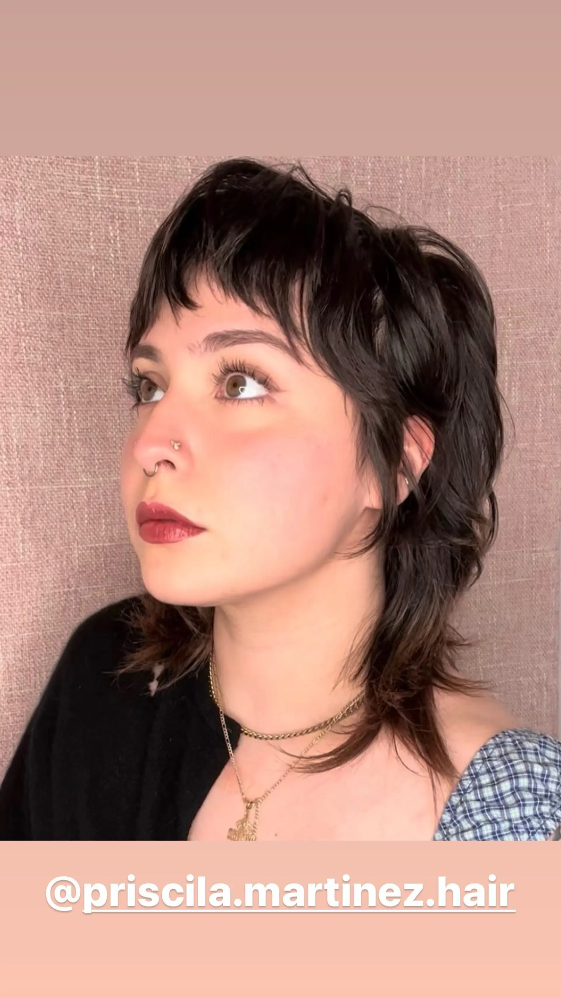 A shaggy, layered mullet with micro bangs. 1