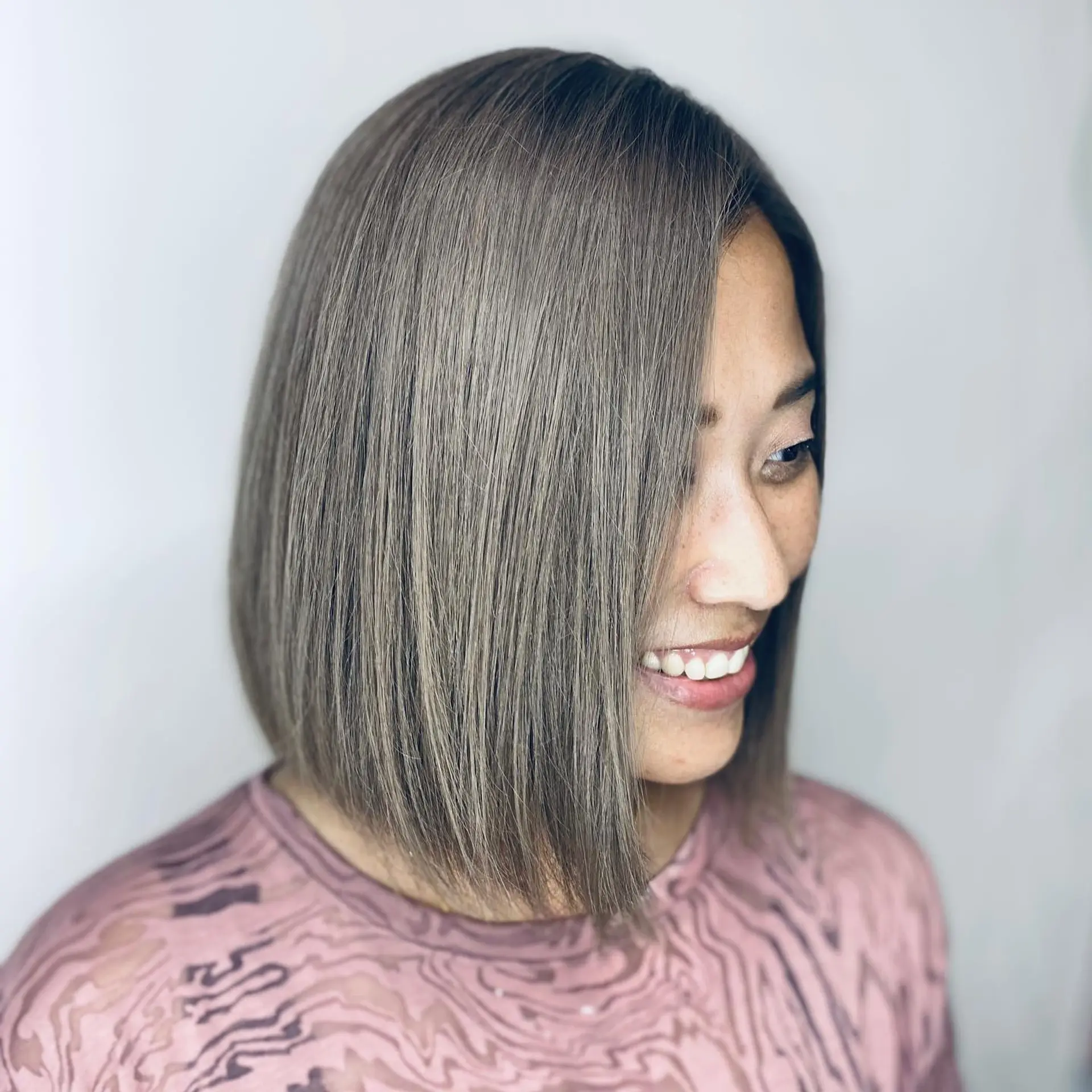 A sleek, medium-length bob with blunt ends. 1