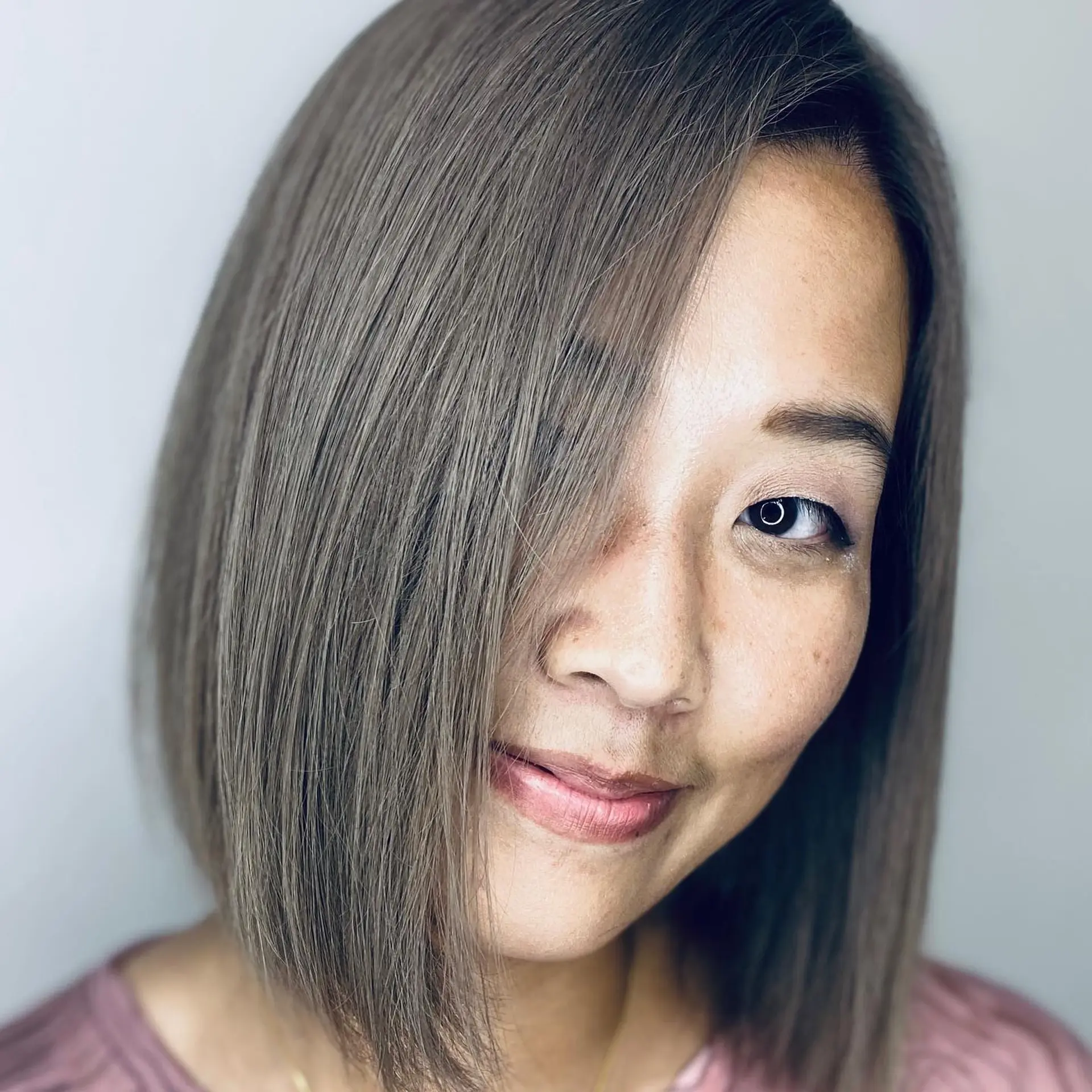 A sleek, medium-length bob with blunt ends. 2