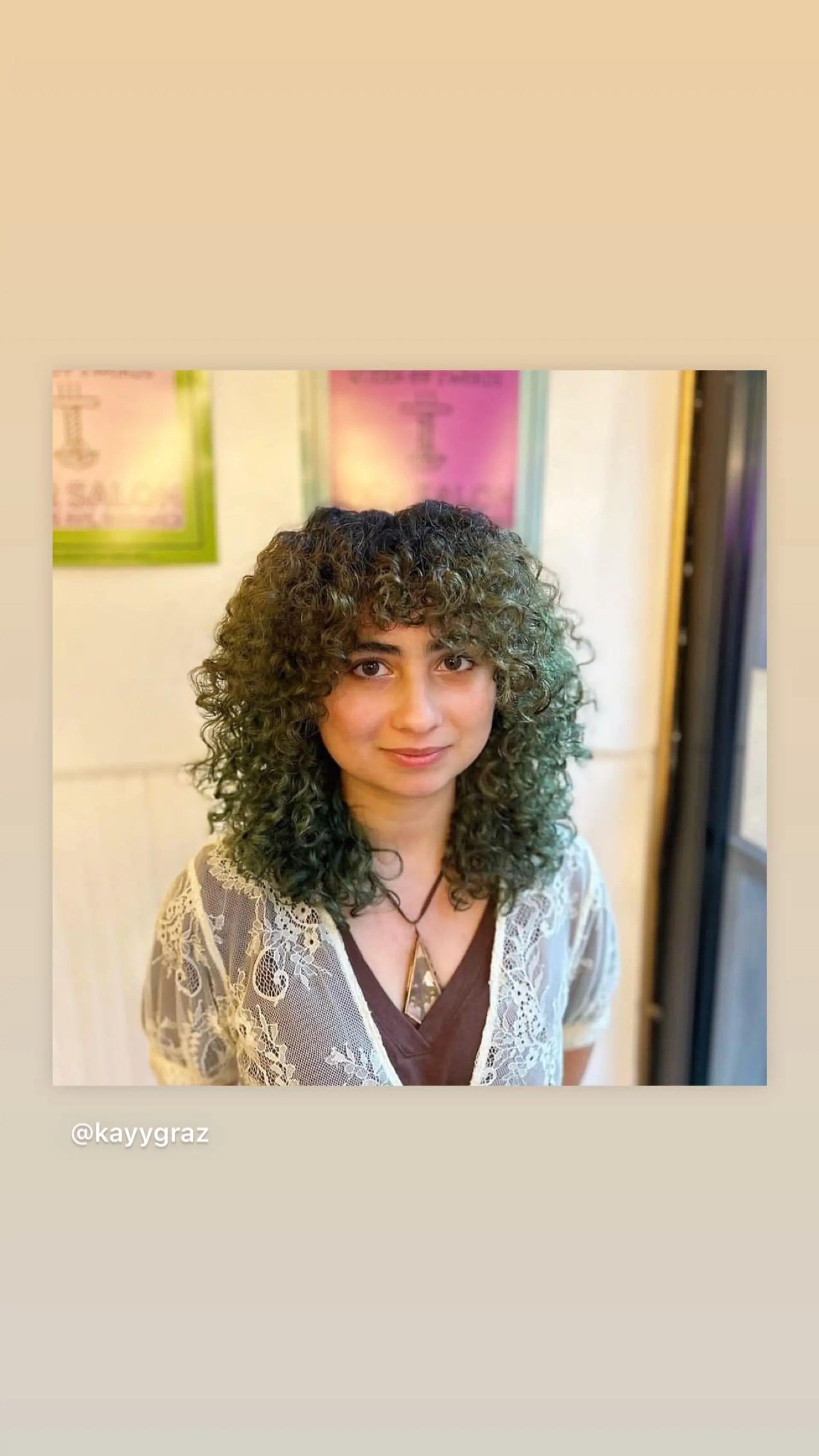 A layered, curly shag with bangs. 1