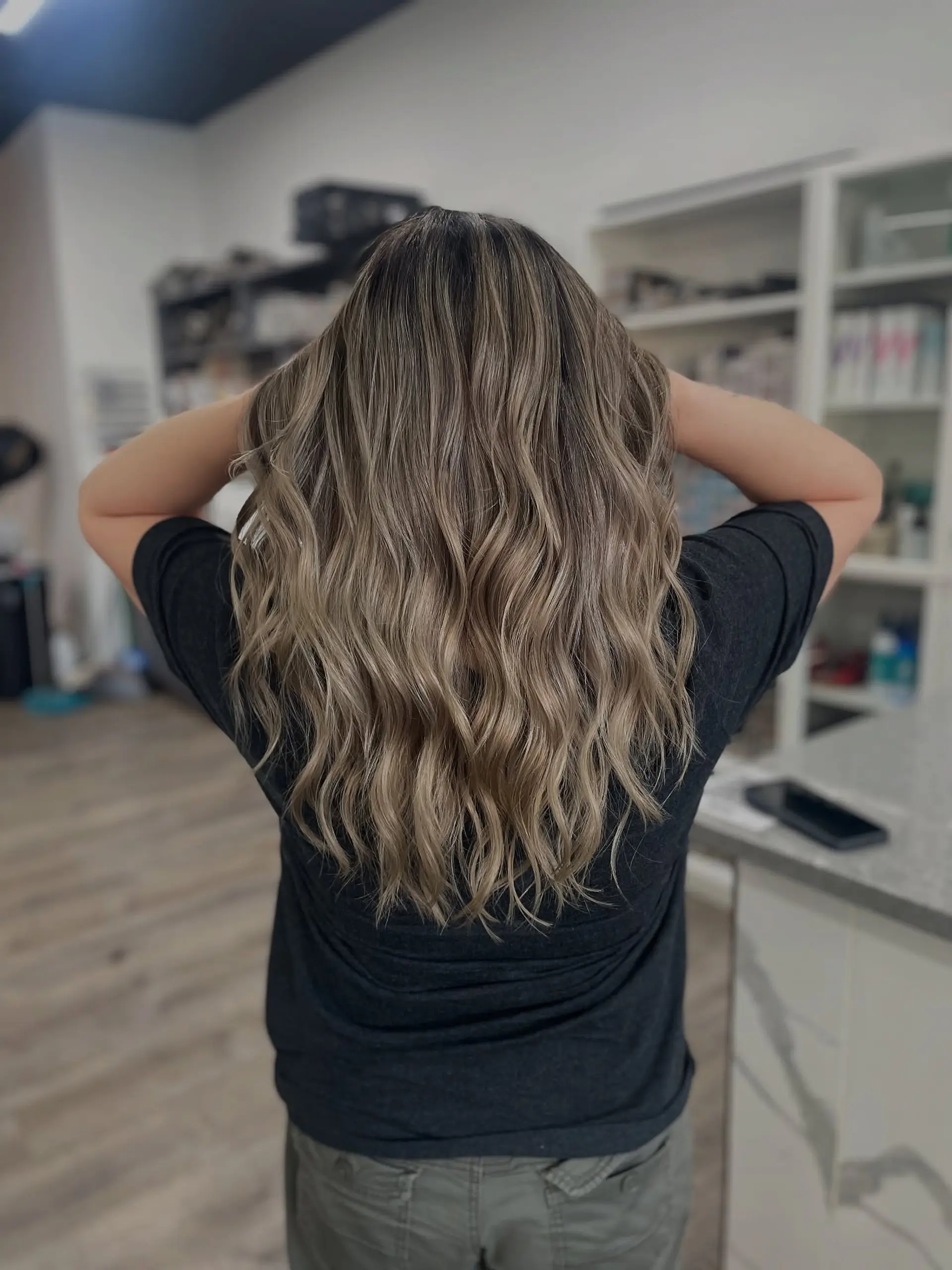 Long, layered waves with an ash blonde balayage ombre. 1