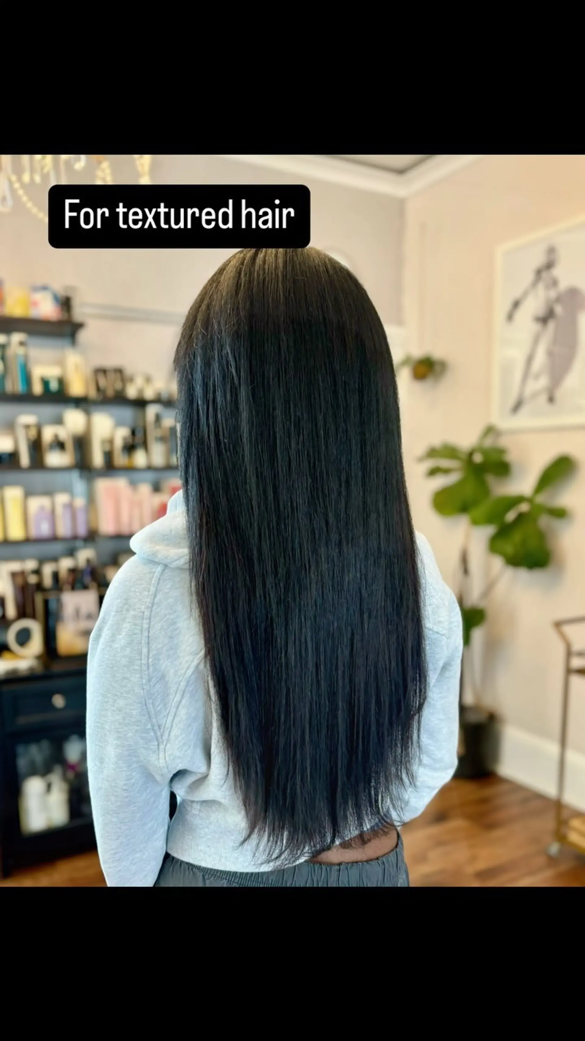 Long, sleek jet-black hair with natural straight texture created using I-tip hair extensions. 1