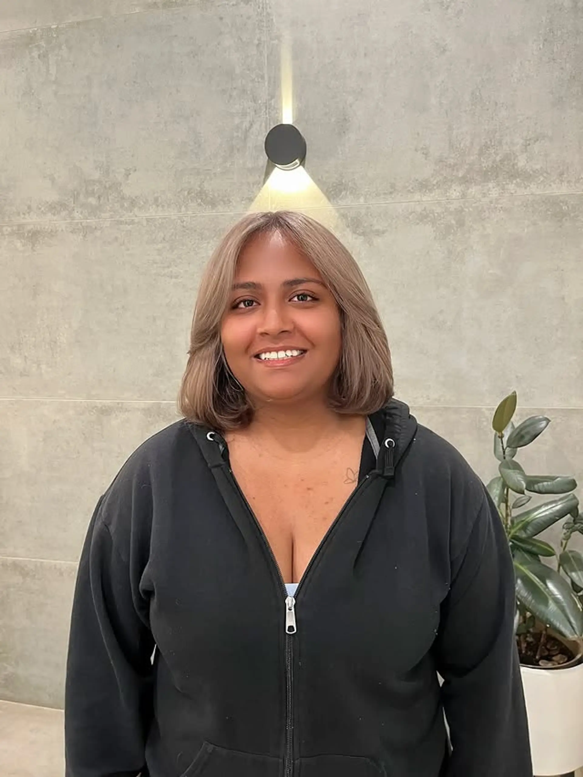 A modern shag haircut with face-framing layers and curtain bangs. 1