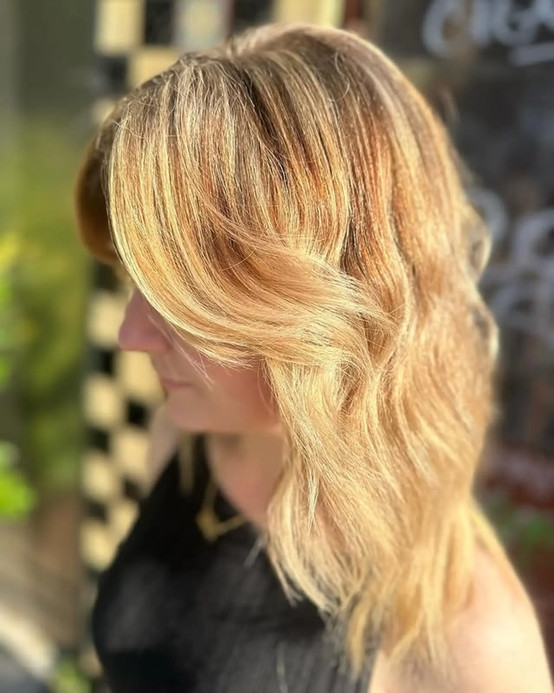 A shaggy, layered haircut with face-framing pieces. 1