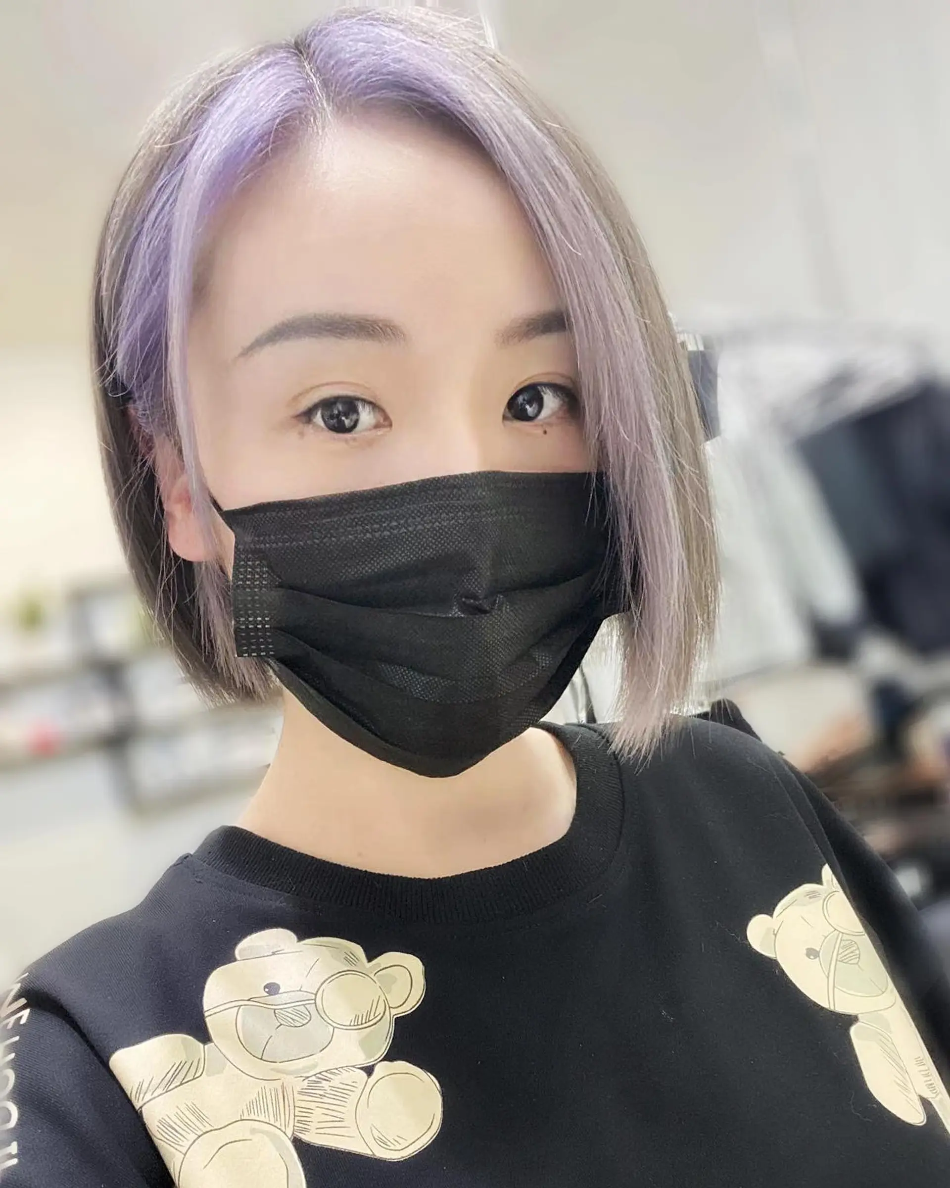 A chin-length bob with a vibrant icy lavender and ash gray color. 1