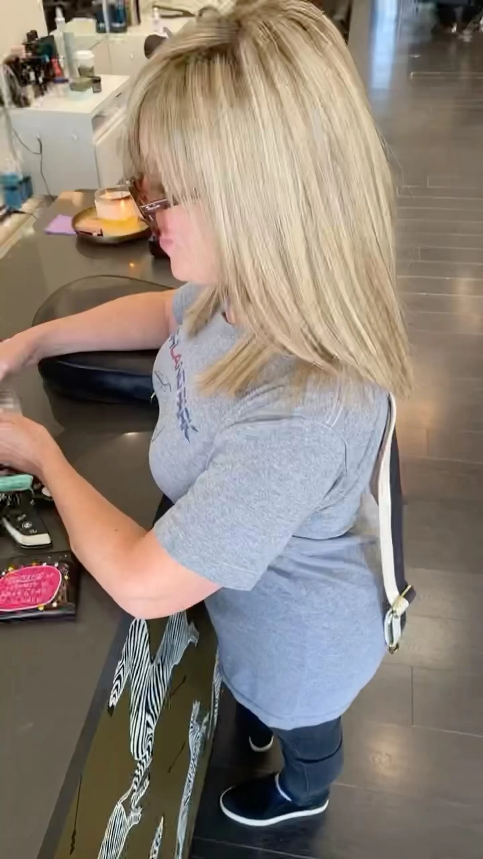 Medium-length straight blonde hair featuring soft highlights and full fringe bangs. 1