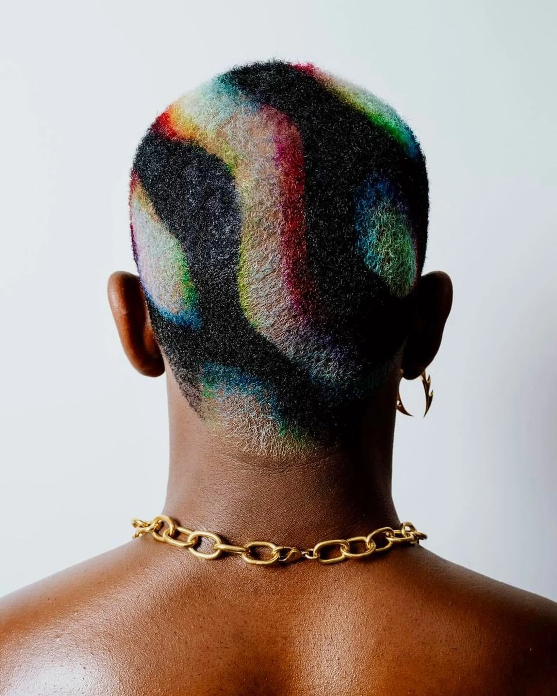 A model with a textured platinum blonde buzz cut, a key 2026 NYC hair trend. - Preview 2