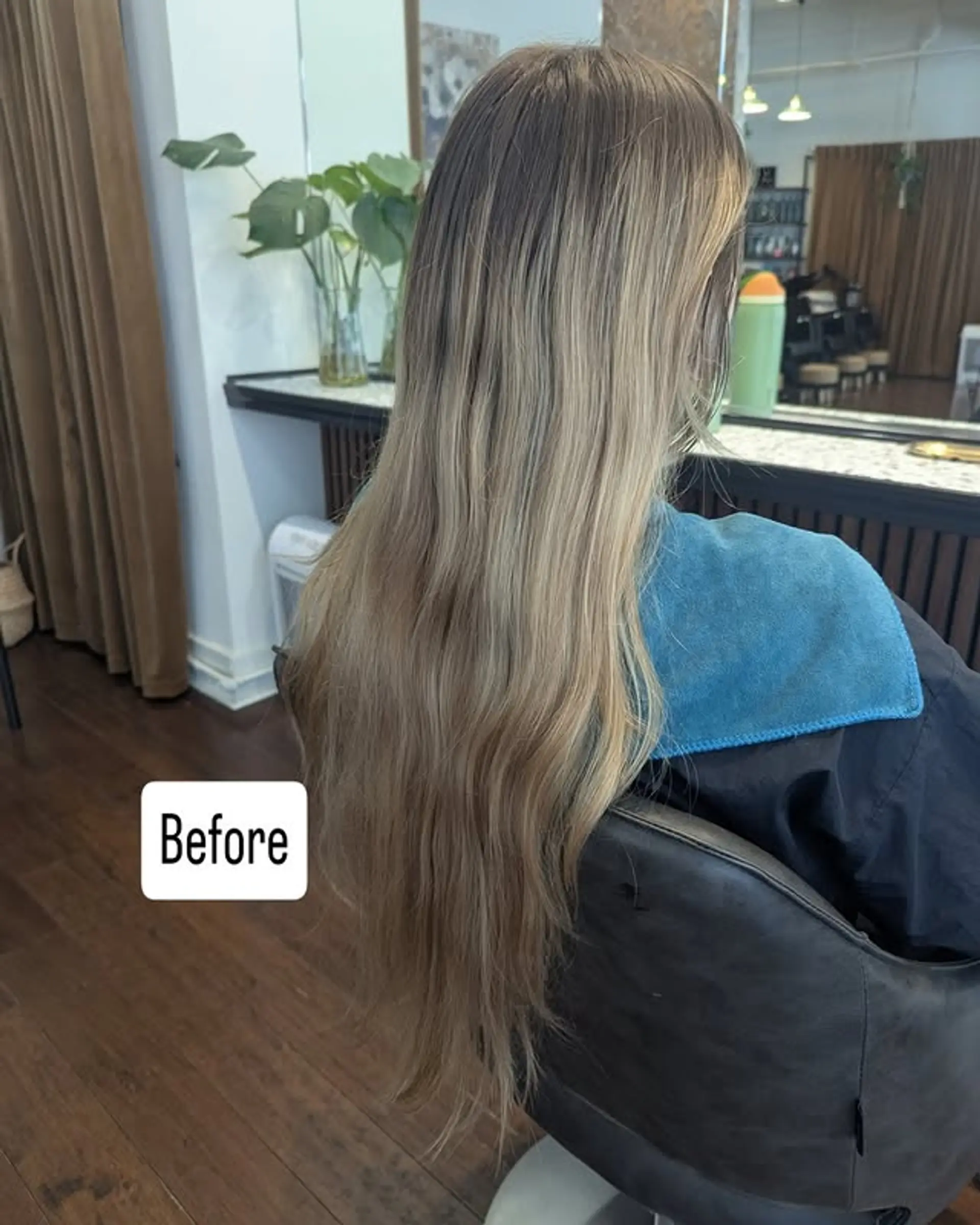 Long, wavy hair with a dark to ash blonde balayage. 1