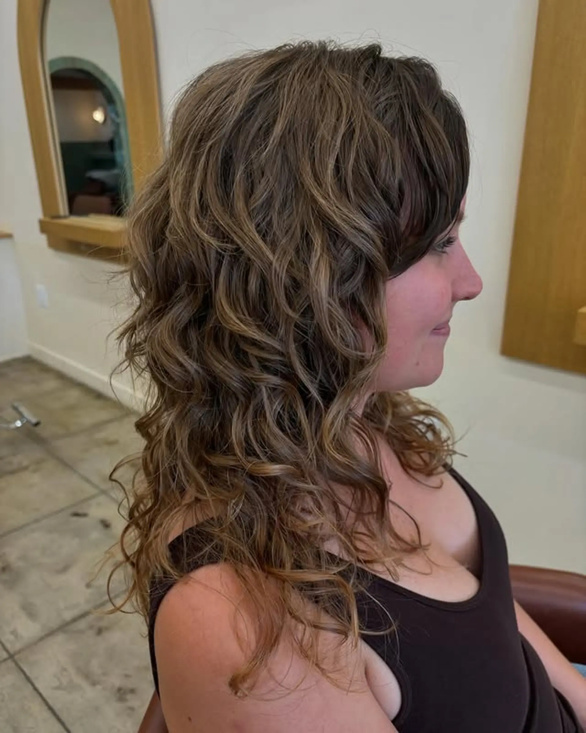A trendy, layered shag with a wavy texture and soft bangs. 1