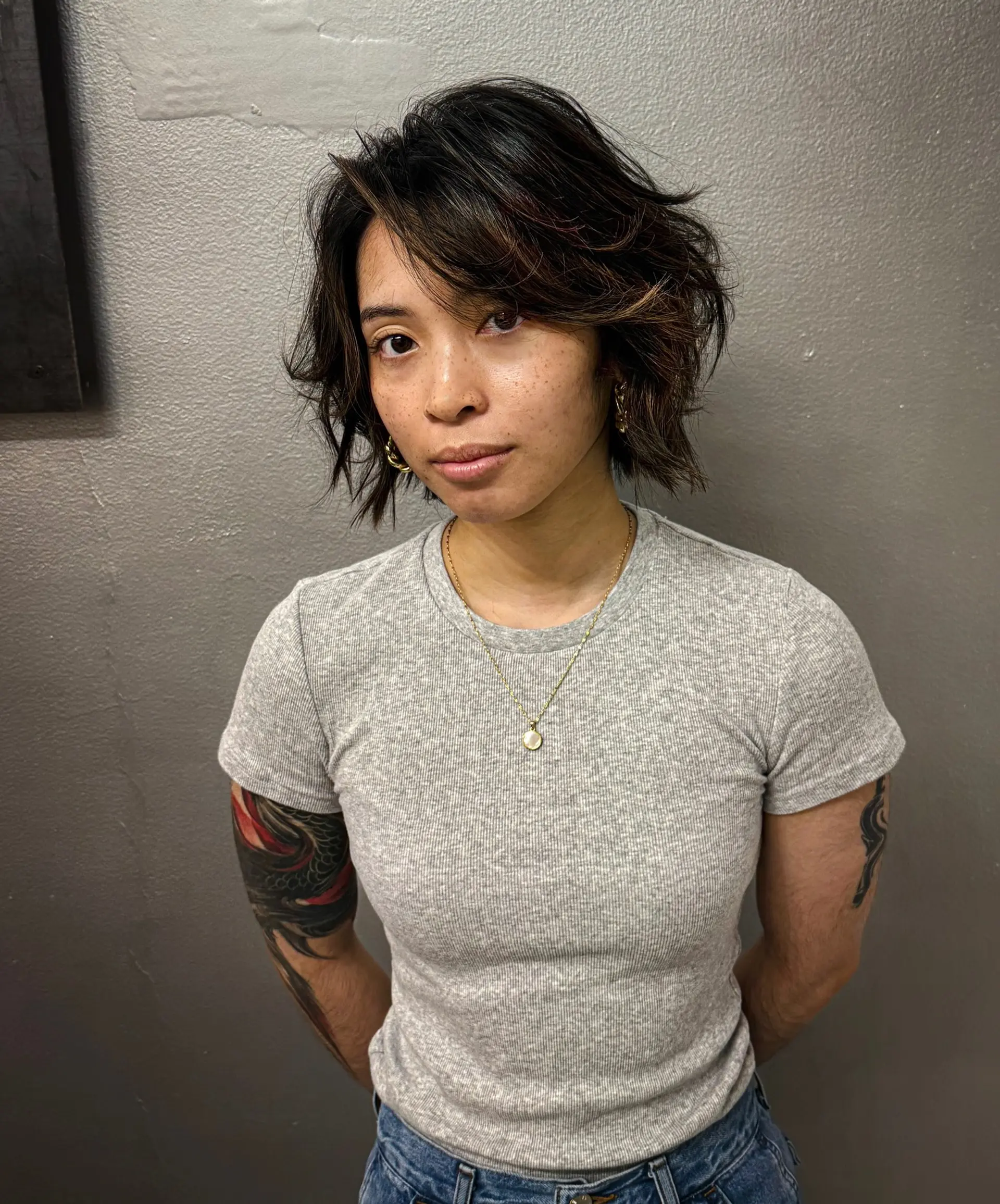 An asymmetrical bob is a short, edgy haircut with uneven lengths on each side. 4