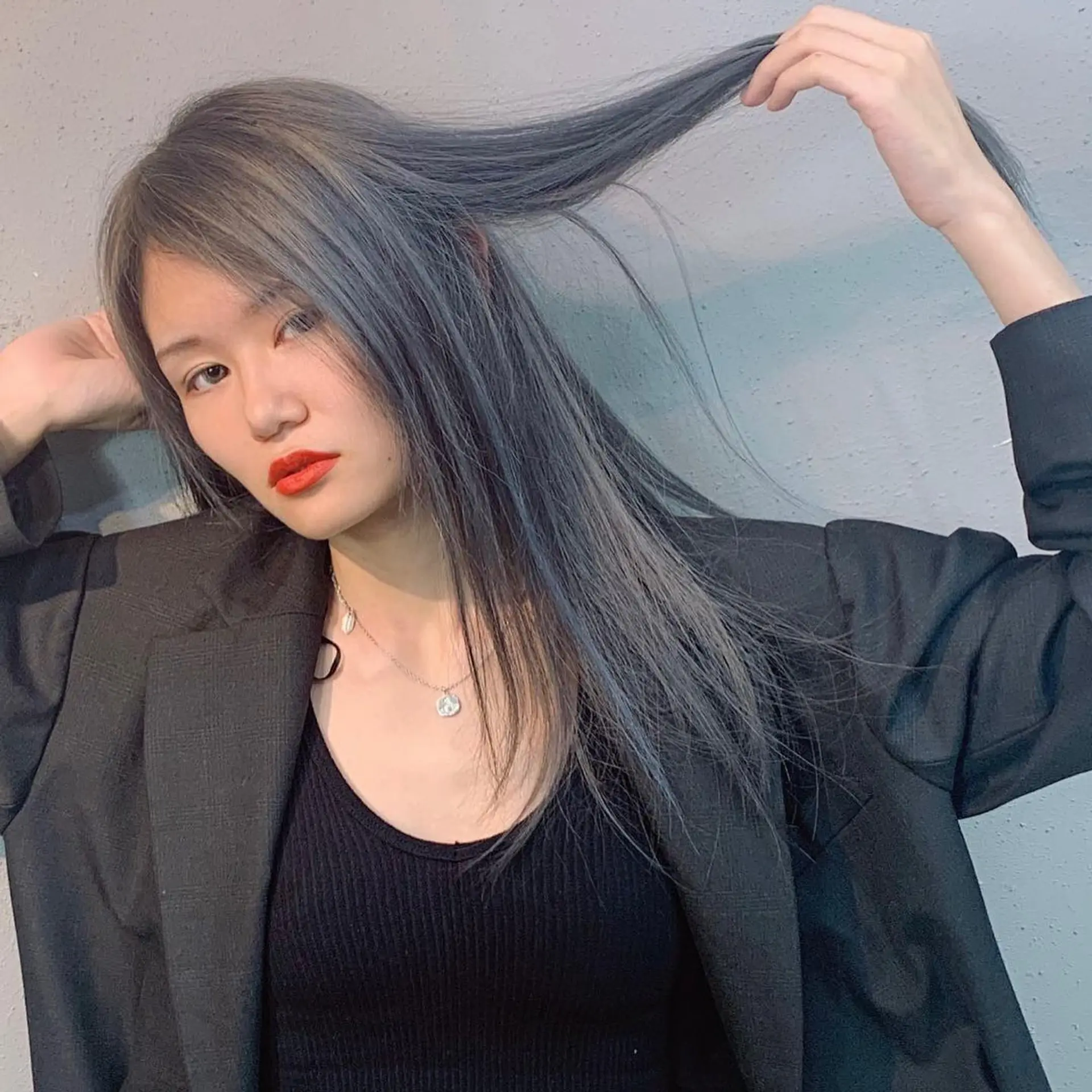 Long straight hair with a striking steel blue ombre color. 1