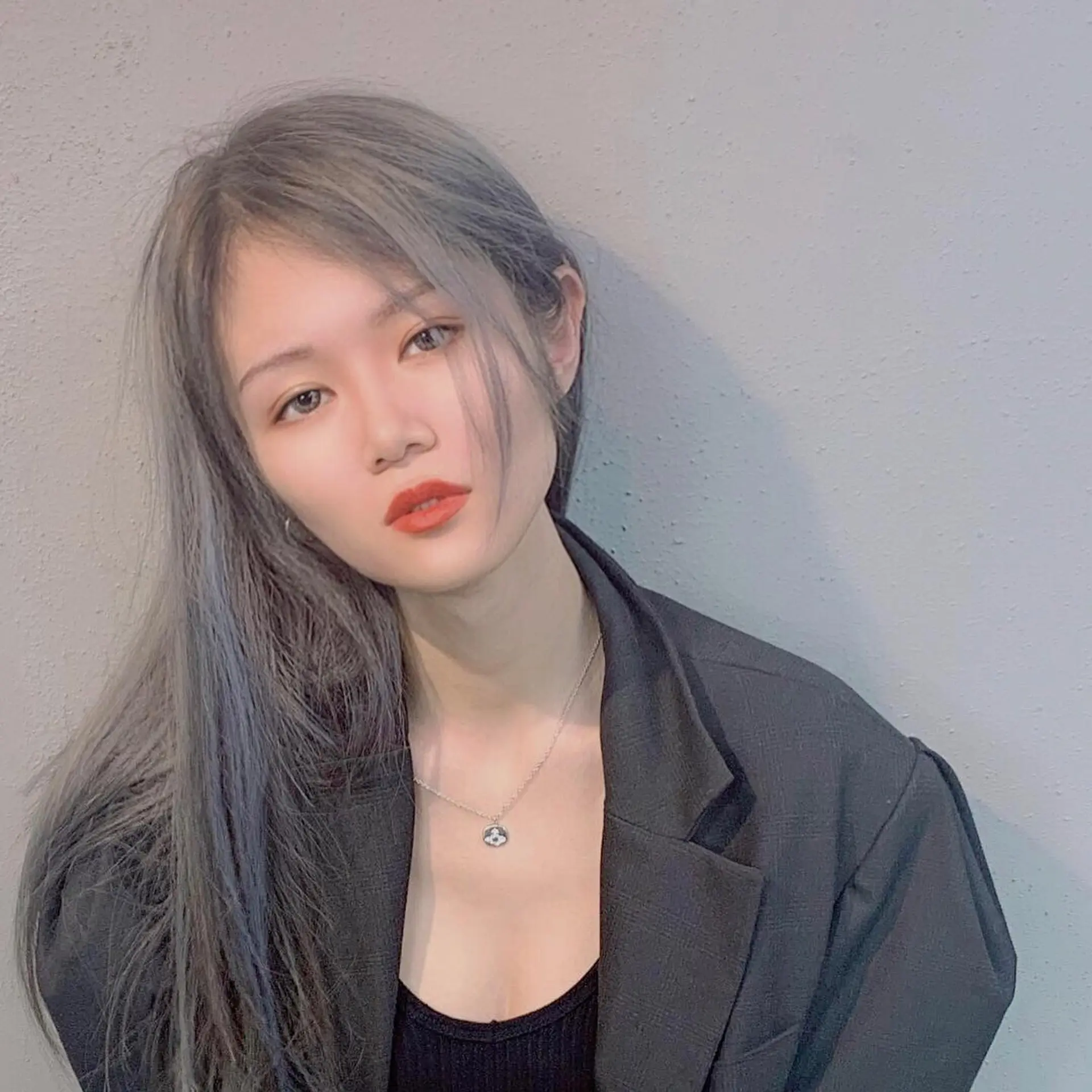 Long straight hair with a striking steel blue ombre color. 3