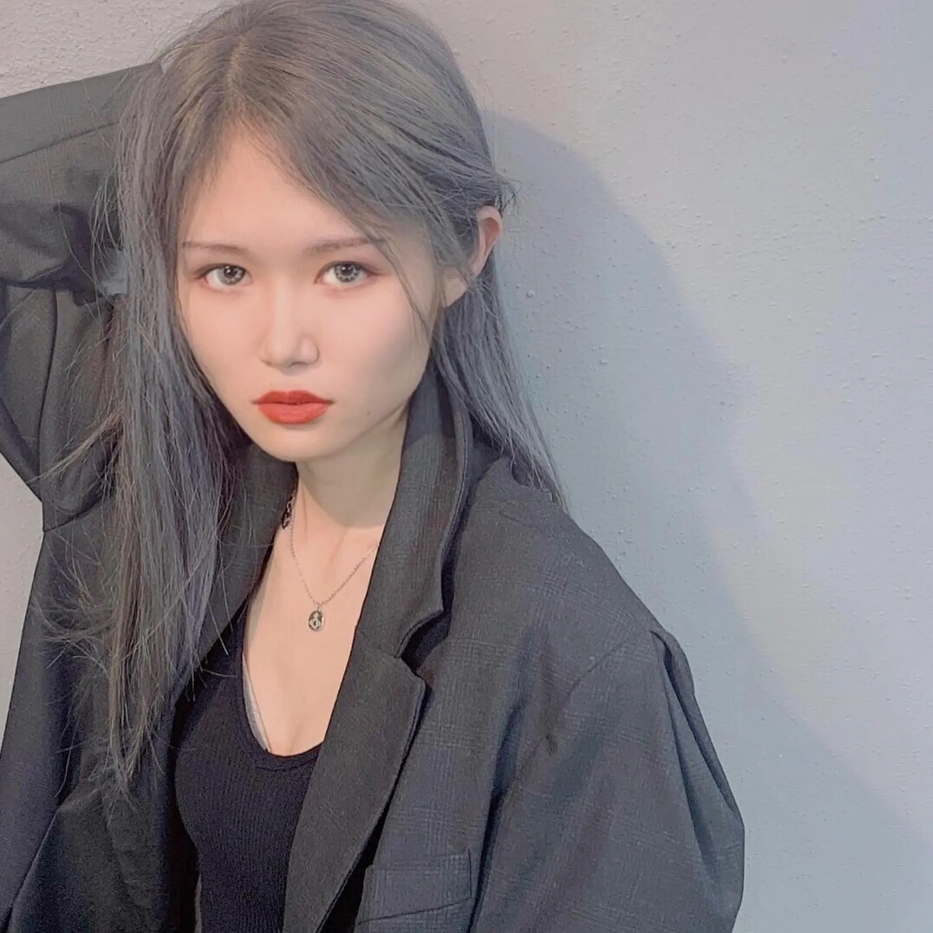 Long straight hair with a striking steel blue ombre color. 4