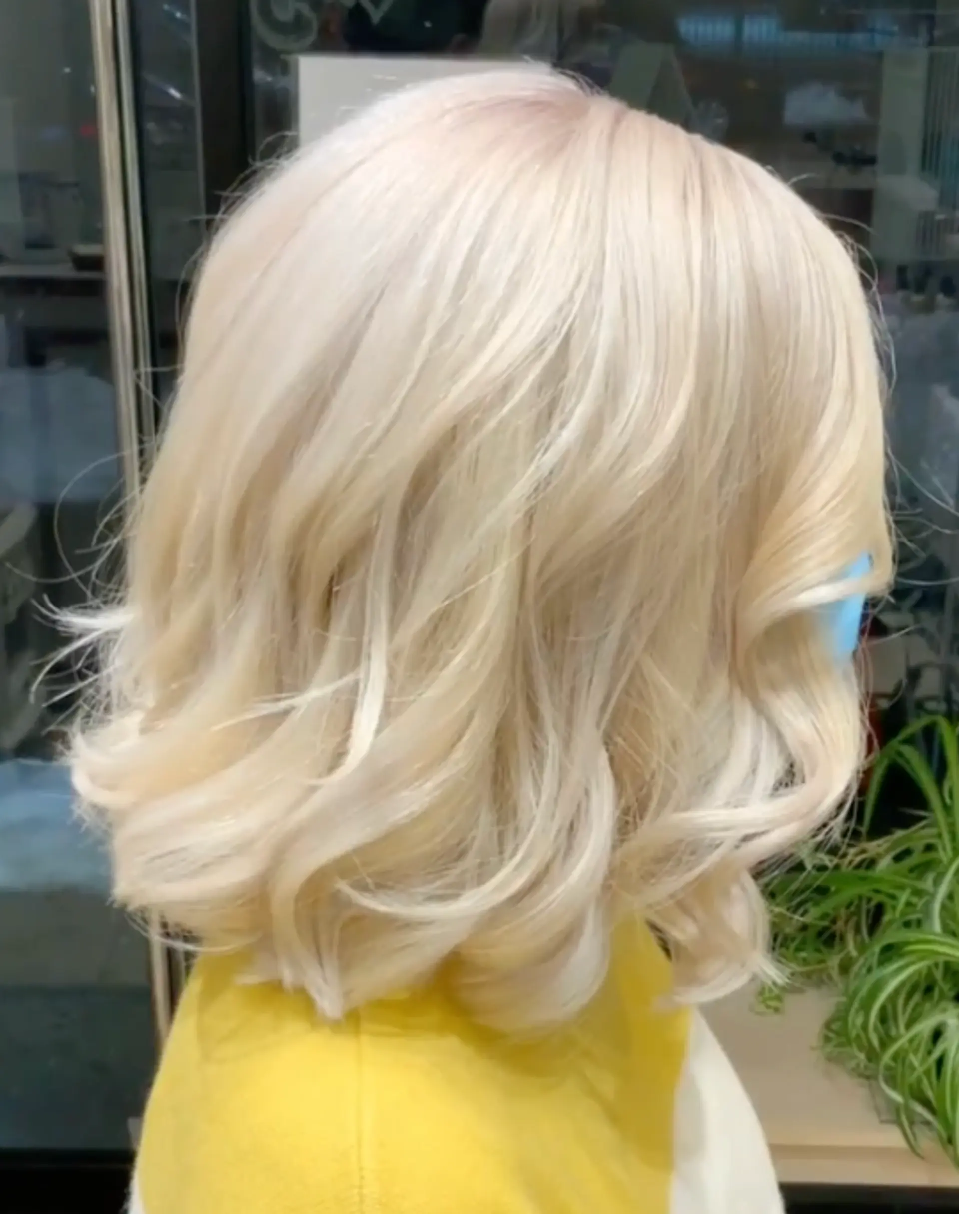 A stylish angled lob with soft waves, perfect for a chic and modern look. 1