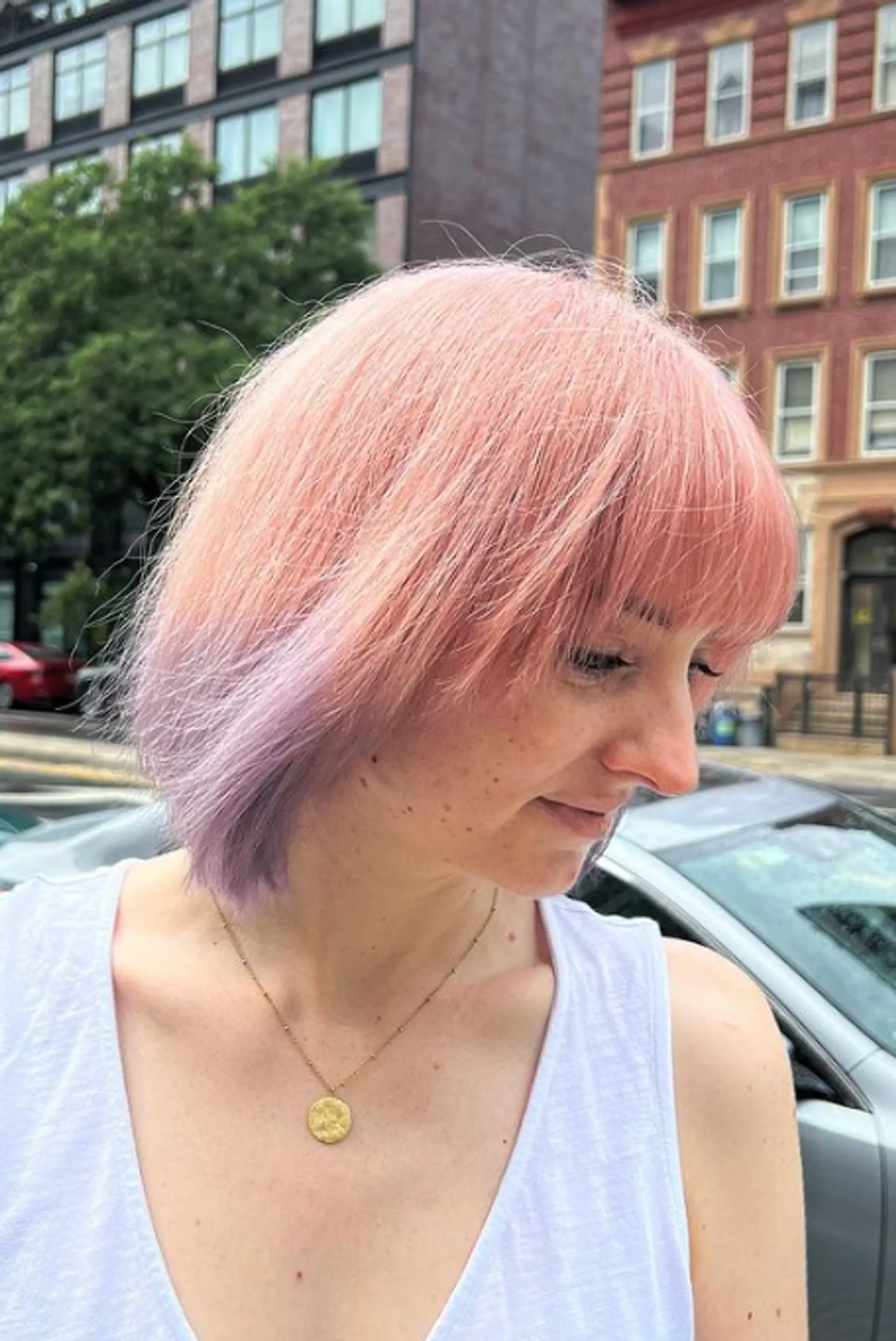 Medium-length bob with pastel pink and lavender tones, featuring straight hair with soft layers and a straight fringe. 1