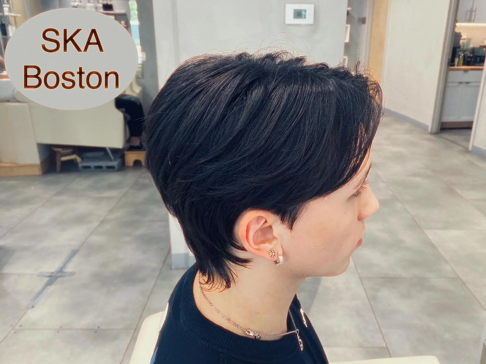 A textured short wolf cut with soft, piecey layers, side-swept fringe, and a slightly tapered nape. 1