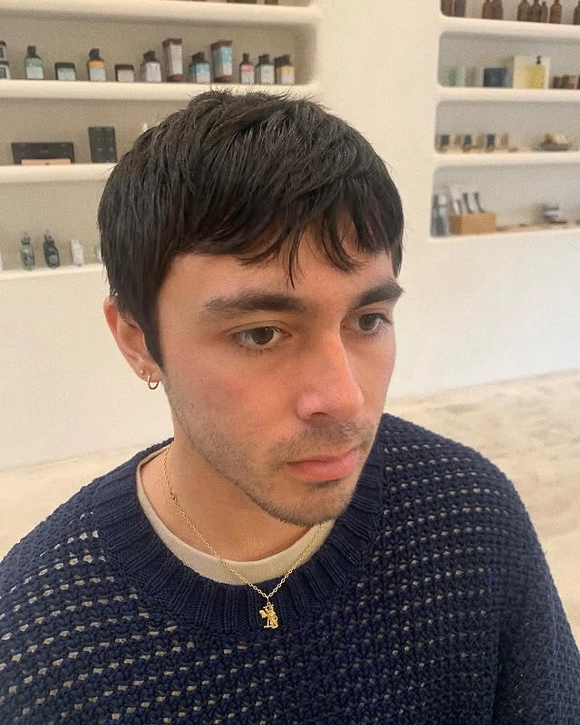 A textured crop with a subtle fringe. 1