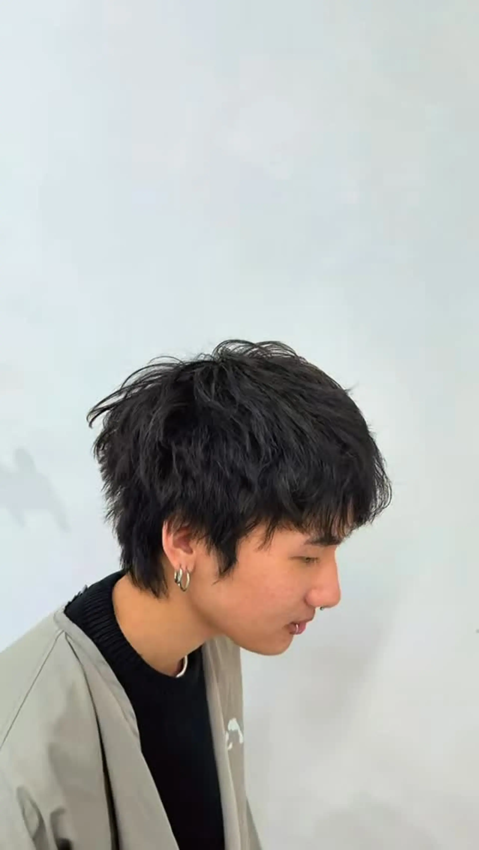 A choppy, layered mod cut styled with tousled texture and soft fringe. 1